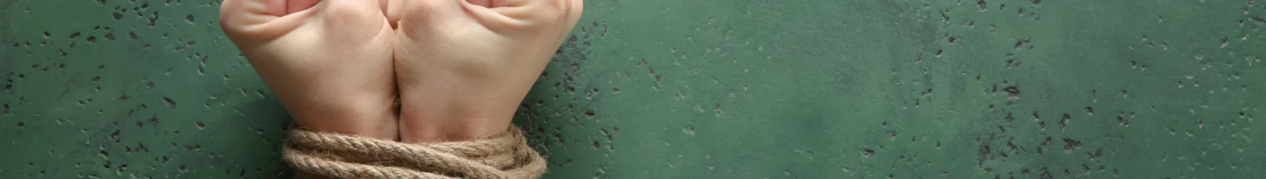 Hands tied with rope