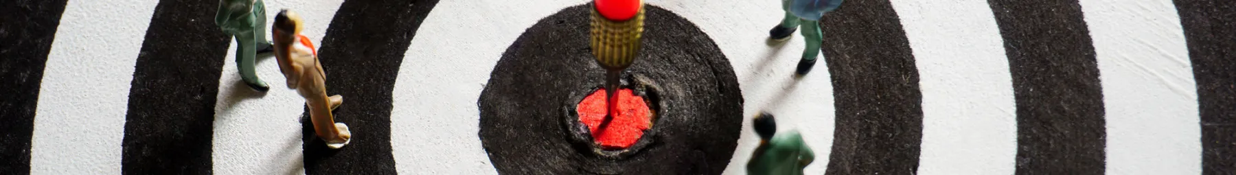 small dartboard with people