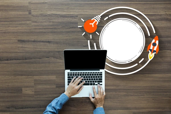 Laptop Lightbulb And Rocket Website